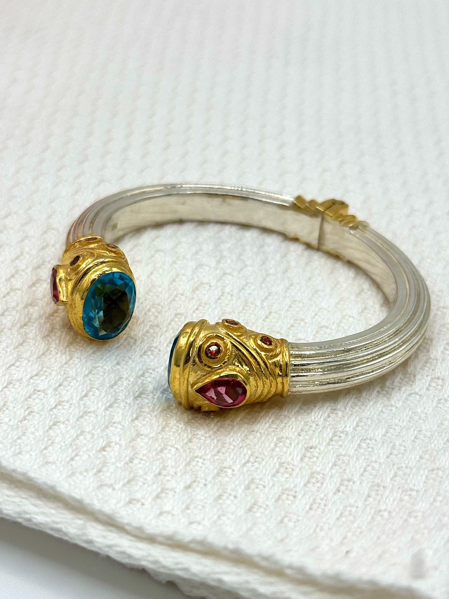 Silver & Gold Plated Blue Topaz, Pink Topaz and Garnet Jewelled Bangle