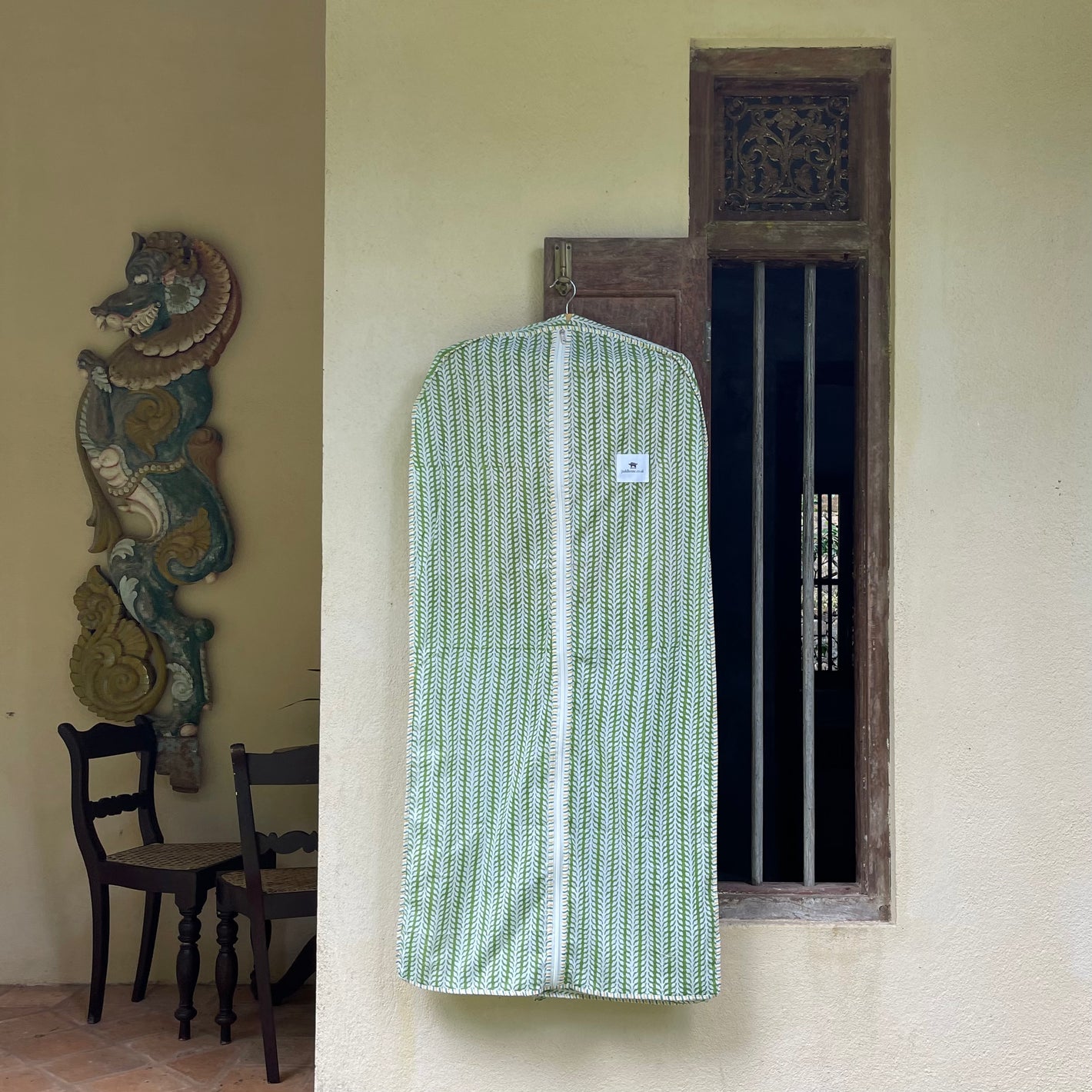 GREEN CLOTHES COVER IN WALL