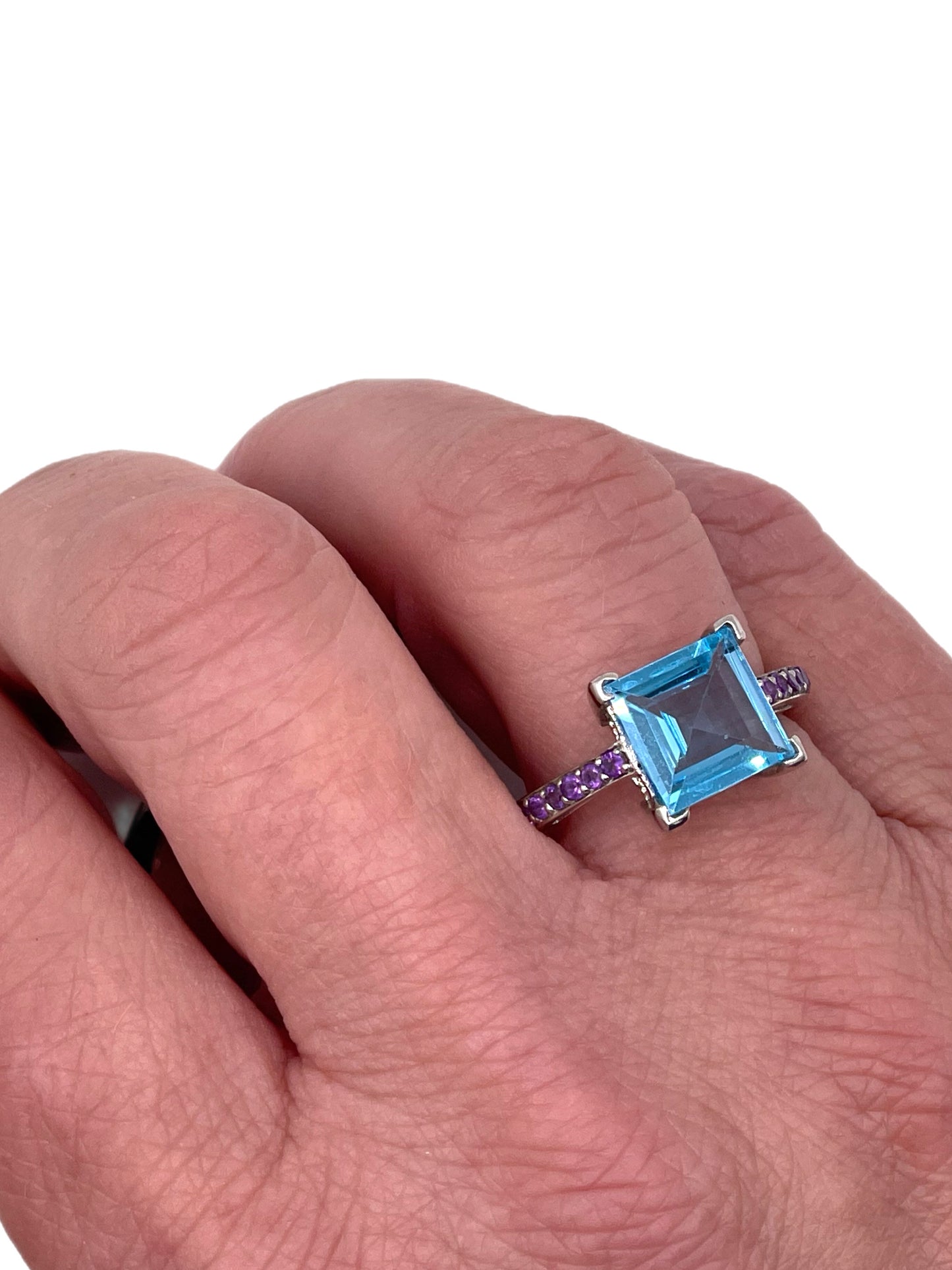 Step Cut Blue Topaz Solitaire Ring