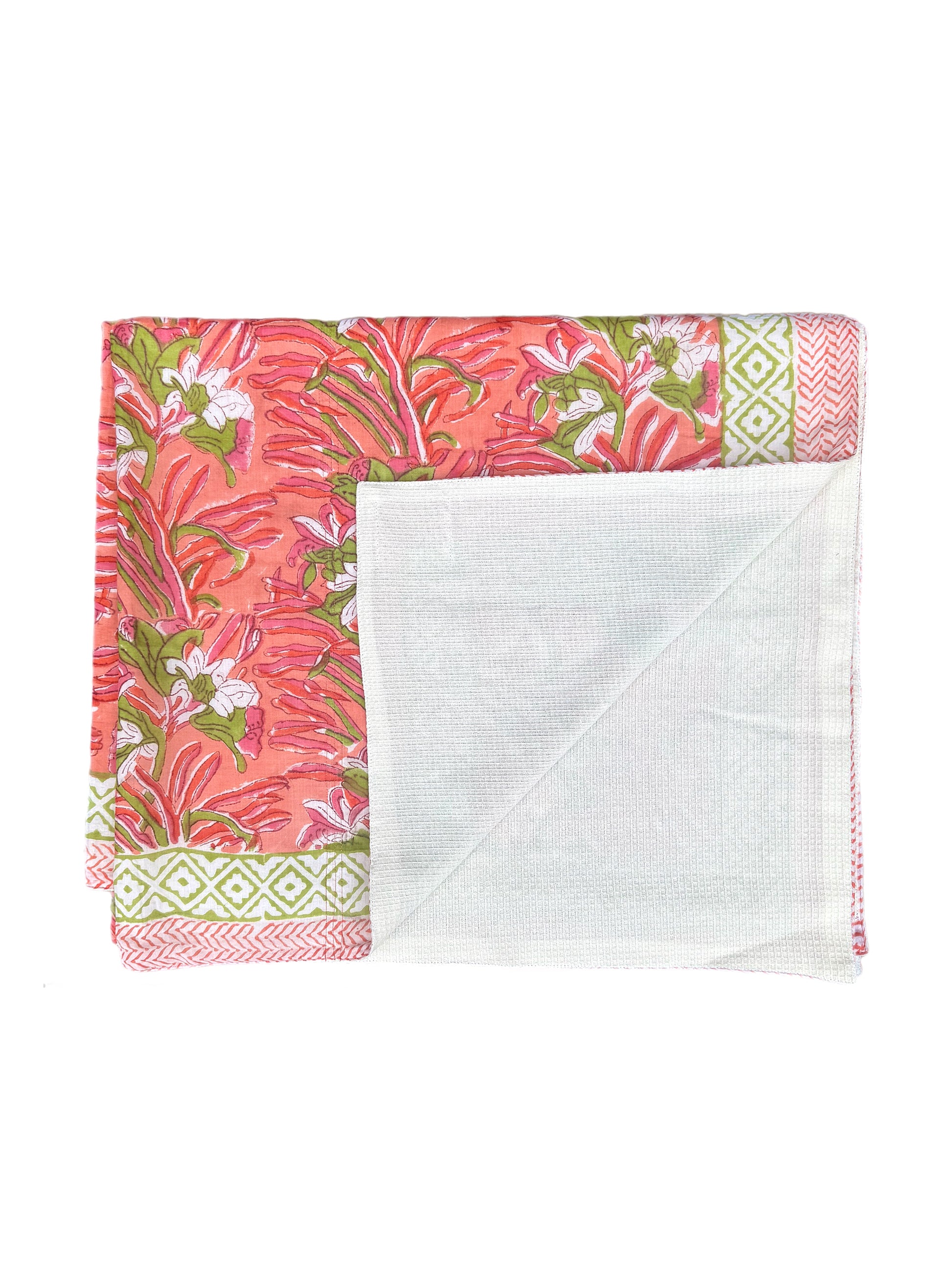 Floral-patterned baby blanket with white center on a white background