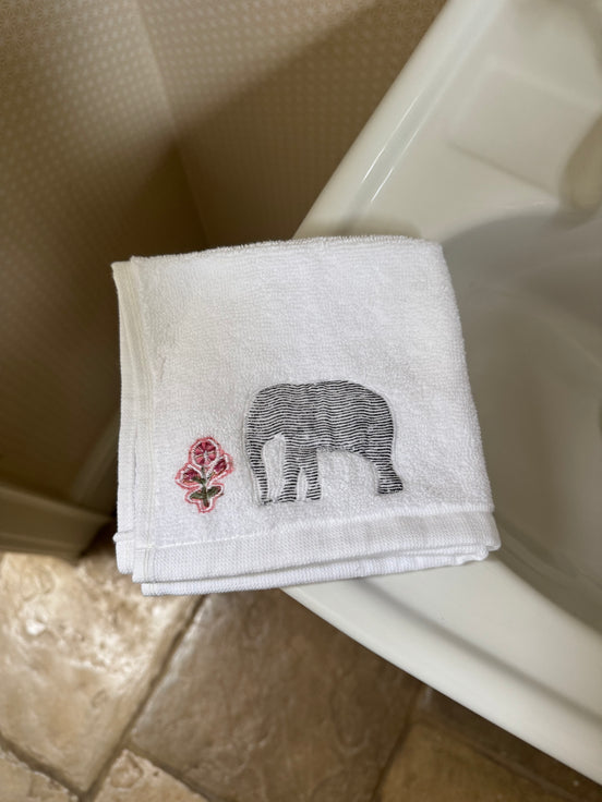 Embroidered face cloth featuring cypress tree & elephant design, 100% cotton