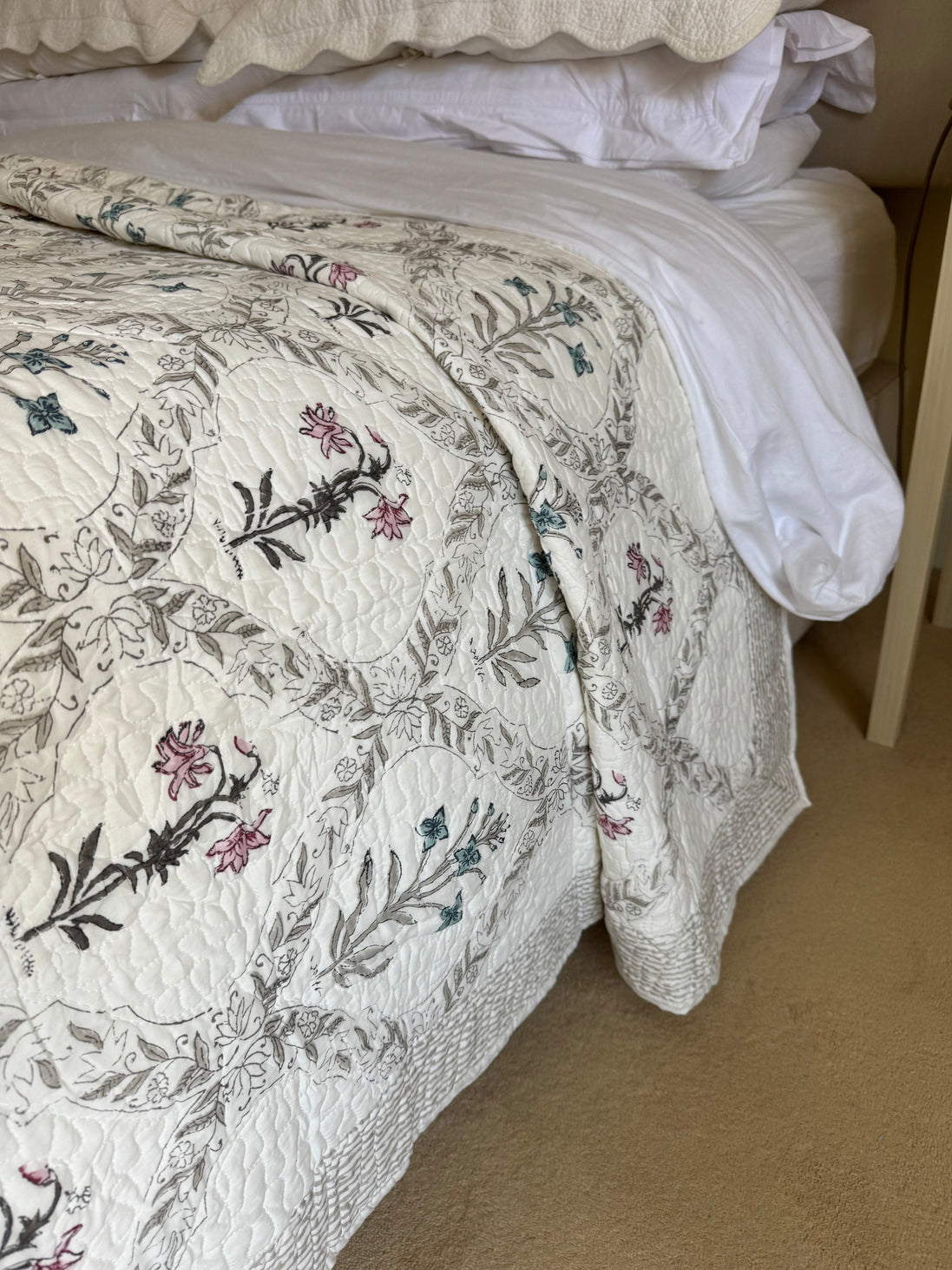 hand-block-printed-bedspread-pink-blue-flower-detail
