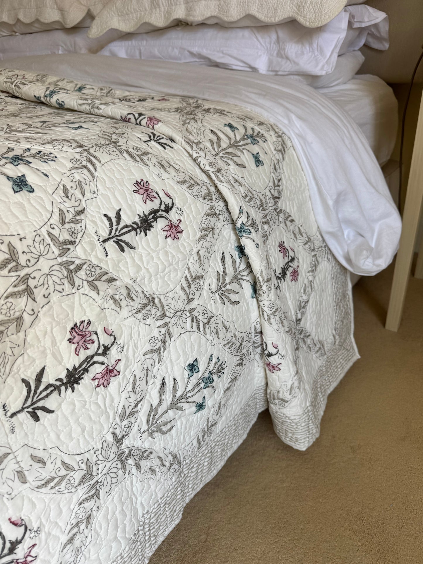 hand-block-printed-bedspread-pink-blue-flower-detail
